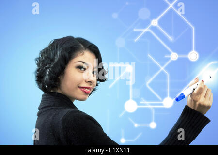 Side view portrait of smiling businesswoman writing of visual screen Stock Photo