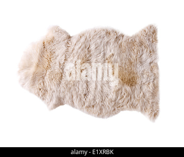 White sheep skin isolated on white background Stock Photo - Alamy