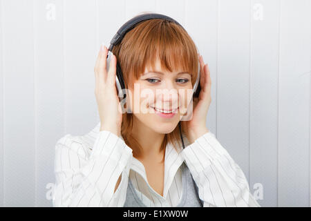 The girl in headphones Stock Photo