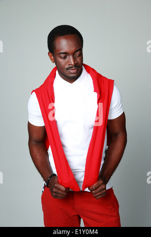 Portrait of a pensive african man isolated on gray background Stock Photo