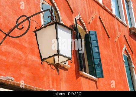 Lantern on the facade of old italian house. Venice Stock Photo