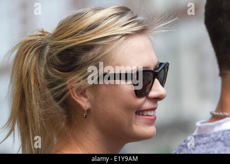 Wimbledon London, 11th June 2014. Recently crowned French open champion Maria Sharapova is seen walking in Wimbledon town Credit:  amer ghazzal/Alamy Live News Stock Photo