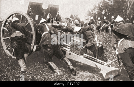 German artillery using man power to get their guns into position during WWI. Stock Photo