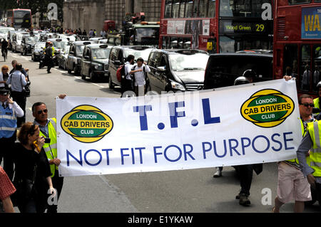 An estimated 12,000 London taxi drivers protest against the new smartphone app 'Uber' which helps people order taxis, but the drivers say is illegal. Whitehall at a standstill. London, UK. 11th June 2014. Stock Photo