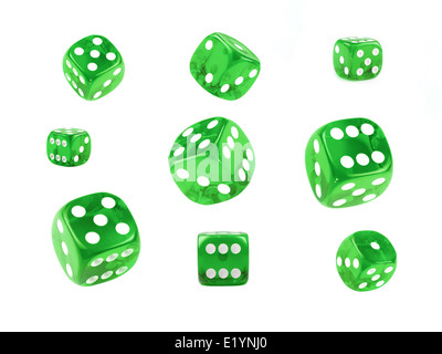 A collection of green dice at different angles isolated on a white background. Stock Photo