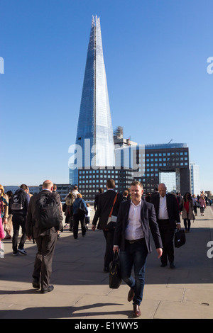 London Bridge - Evening Rush Hour - Shard Skysraper in background. Stock Photo