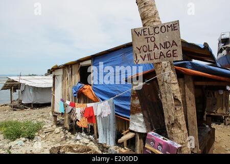 Tacloban City, Philippines. 11th June, 2014. A general view of the  community of Anibong in Tacloban City. On November 8, 2013, Haiyan, one of the most powerful typhoon to ever hit land, ravaged Eastern Visayas leaving thousands dead and homeless. Government estimates 16 million people to have been affected by the typhoon, with 6,300 reported dead and thousands more missing. Credit:  PACIFIC PRESS/Alamy Live News Stock Photo