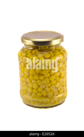 glass jar with sweet ecological canned corn isolated on white Stock Photo