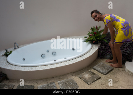 Rarotonga Island. Cook Island. Polynesia. South Pacific Ocean. Bathroom and bathtub of luxury hotel Little Polynesian Resort in Stock Photo