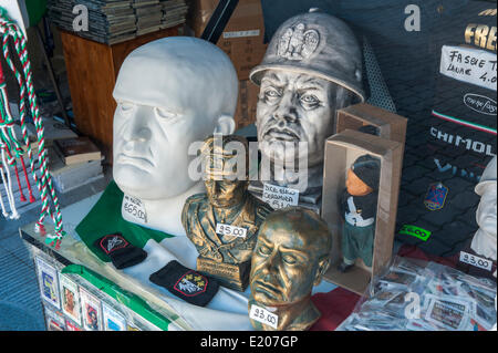 Souvenir shop, heads of Mussolini and fascist symbols in a shop window, glorification of fascism, birthplace of Mussolini Stock Photo
