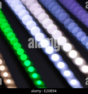 Bokeh out of focus LED lights creating colorful pattern and abstract shapes Stock Photo