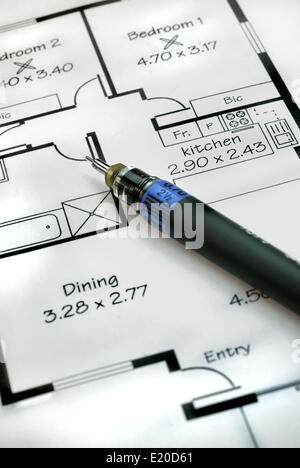 Architects pen and plans Stock Photo
