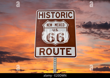 Historic Route 66 New Mexico sign with sunset sky. Stock Photo