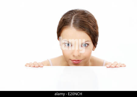 Looking out pleasantly surprised girl Stock Photo