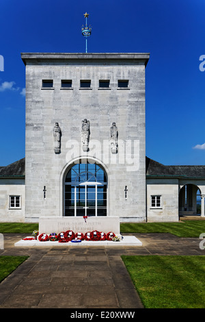 Wreaths laid at the Remembrance Stone in front of the Chapel at the Commonwealth AIr Forces Memorial Stock Photo