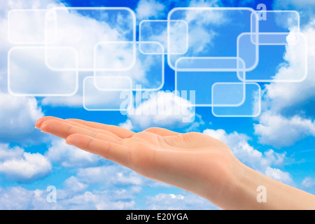 Cloud computing concept with woman hand close-up Stock Photo