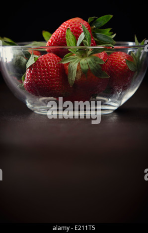 Strawberries in a glass bowl Stock Photo