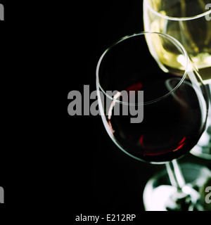 Glasses of wine on black background Stock Photo
