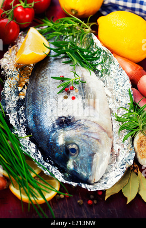 fresh dorada fish with vegetables Stock Photo