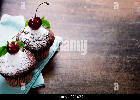 fresh chocolate muffins with cherry Stock Photo