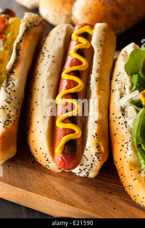 Gourmet Grilled All Beef Hots Dogs with Sides and Chips Stock Photo