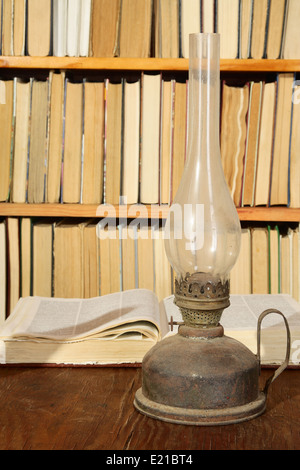 Vintage still-life with books and parafin lamp Stock Photo