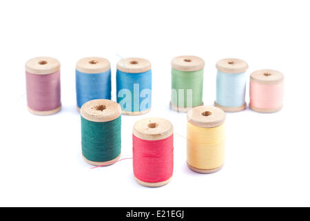 Old thread spools isolated on white background Stock Photo - Alamy