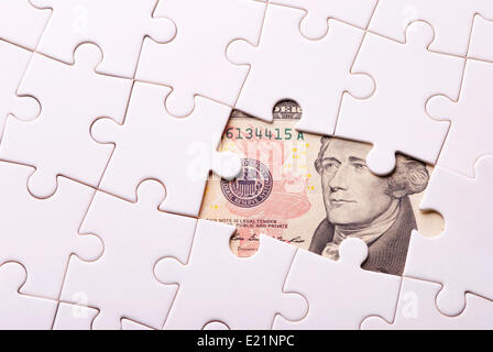 Find out wealth from the puzzle game Stock Photo