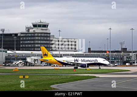 Manchester Airport, England, with Monarch Airlines airliner in foreground Stock Photo