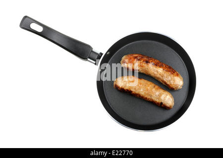 fried sausage in a frying pan Stock Photo