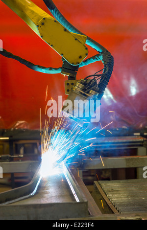 Robotic Welding In Factory Stock Photo