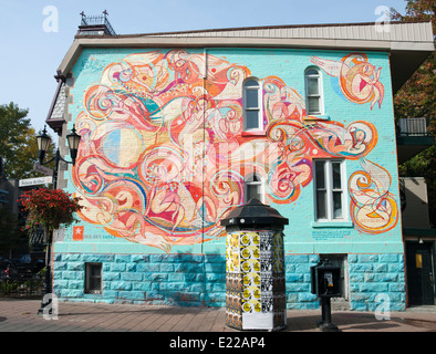 Colorful mural on a wall in Quartier Latin Montreal Canada Stock Photo