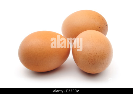 three chicken eggs on white background Stock Photo