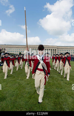 US Army Old Guard Fife and Drum Corps welcome Australian Prime Minister Tony Abbott to the Pentagon during a formal arrival ceremony June 13, 2014 in Arlington, VA. Stock Photo