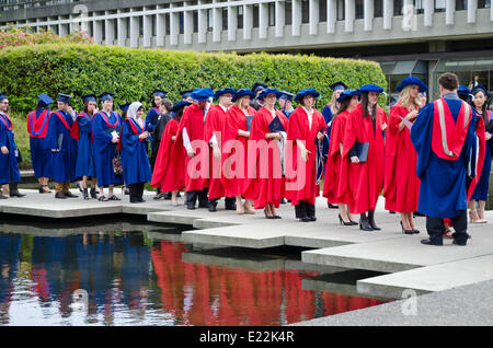 BURNABY, British Columbia,  CANADA.  JUNE 12, 2014:  Simon Fraser University graduands wait for the Spring 2014 convocation ceremony for the Faculty of Arts and Social Sciences to begin. Stock Photo