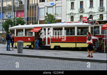 An old vintage tram converted to a restaurant in the middle of Wenceslas Square, Prague, czech Republic. Stock Photo