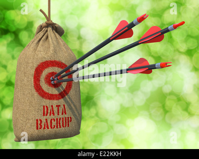 Data Backup - Arrows Hit in Red Mark Target. Stock Photo