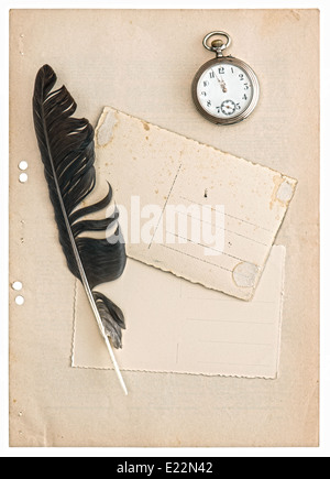 vintage papers and postcards isolated on white background. antique feather pen and clock Stock Photo