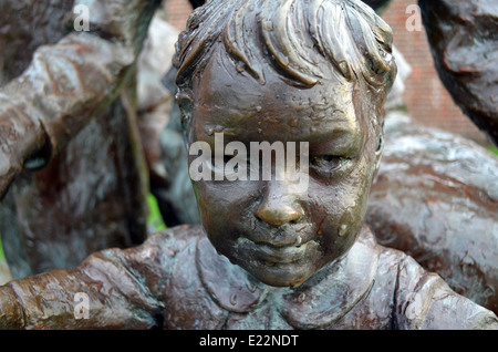 Detail of the young girl on the Emigrants statue at the Albert Dock, Liverpool Stock Photo