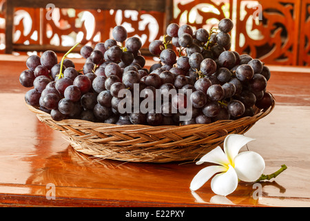 Fresh grapes in a basket Stock Photo