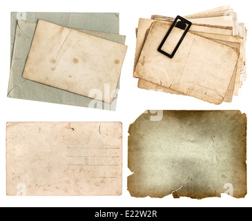 aged grungy papers and postcards isolated on white background Stock Photo