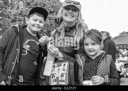 Family day out at the classic car event Stock Photo