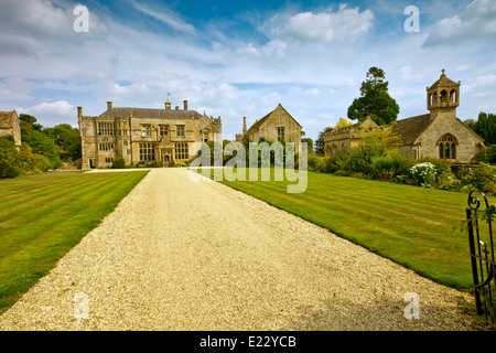 The west front and driveway at Brympton d'Evercy House nr Yeovil, Somerset, England, UK Stock Photo