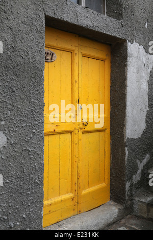 Brightly color doors in the tiny fishing village of Riomaggiore, Cinque Terre, Italy Stock Photo