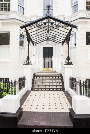 A grand entrance to large stucco-fronted house in Holland Park, West London Stock Photo