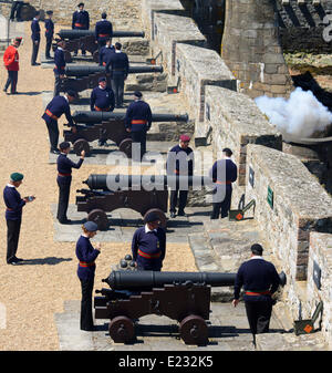 Castle Cornet, St. Peter Port, Guernsey, Channel Islands. 14th June 2014. A 21 gun salute at Noon marks the official birthday of the Queen. The guns are manned by volunteer crews and the local Combined Cadet Force mount a guard of honour.  Guernsey is a Crown Dependency of the British Crown and every year it opens all its museums to the public for free to mark the occasion. Credit:  Robert Smith/Alamy Live News Stock Photo