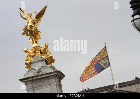 London, UK. 14th June 2014. Hundreds of Guardsmen take part in the Trooping the Colour parade, make their way along the Mall to the Horse Guards Parade Ground. The Trooping of the colour marks the second of the Queen's two birthdays (this is the official one, her actual birthday is on 21st April). Credit:  david mbiyu/Alamy Live News Stock Photo