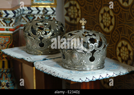 Silver crowns for orthodox wedding ceremony in the Orthodox Church of Saint Vladimir in Marianske Lazne, Czech Republic. Stock Photo