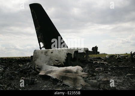Lugansk. 14th June, 2014. Photo taken on June 14, 2014 shows wreckages of a military transport plane near an airport in Lugansk, Ukraine. At least 49 Ukrainian troops were killed after a military transport plane was shot down by anti-government militants in the eastern city of Lugansk early Saturday. Credit:  Alexander Ermochenko/Xinhua/Alamy Live News Stock Photo