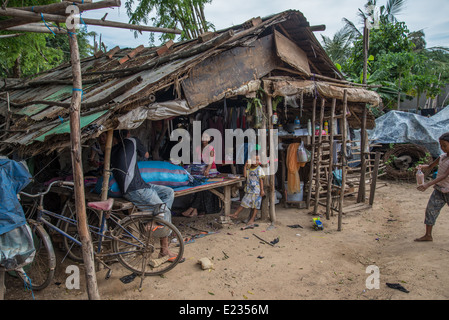 poor family in Cambodia,Asians, Asian, Asia, outside, outdoor, , employment, family, women, working, activity, poor, buildings, Stock Photo